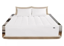 bed with mattress topper