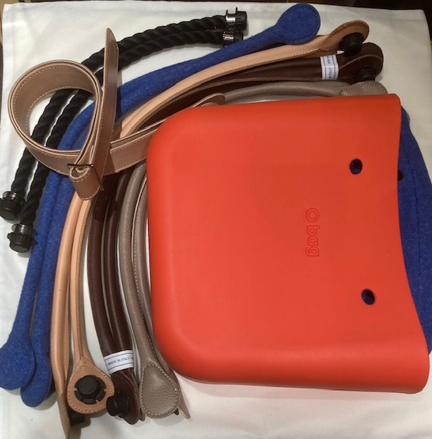 O Bag in Orange Color With 10 Various Accessories